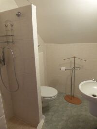 kúpeľňa vo vrchnej spálni v apartmáne Tania